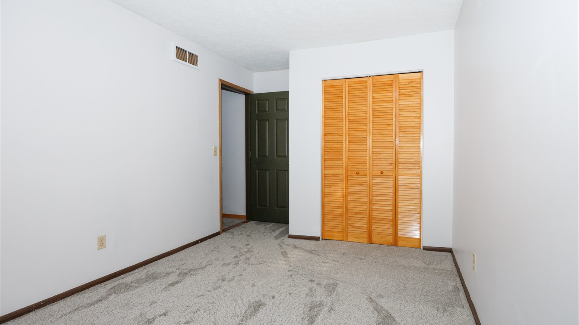 306 Judith Drive Normal, IL 61761 - Photo 18 of 40 an empty room with windows