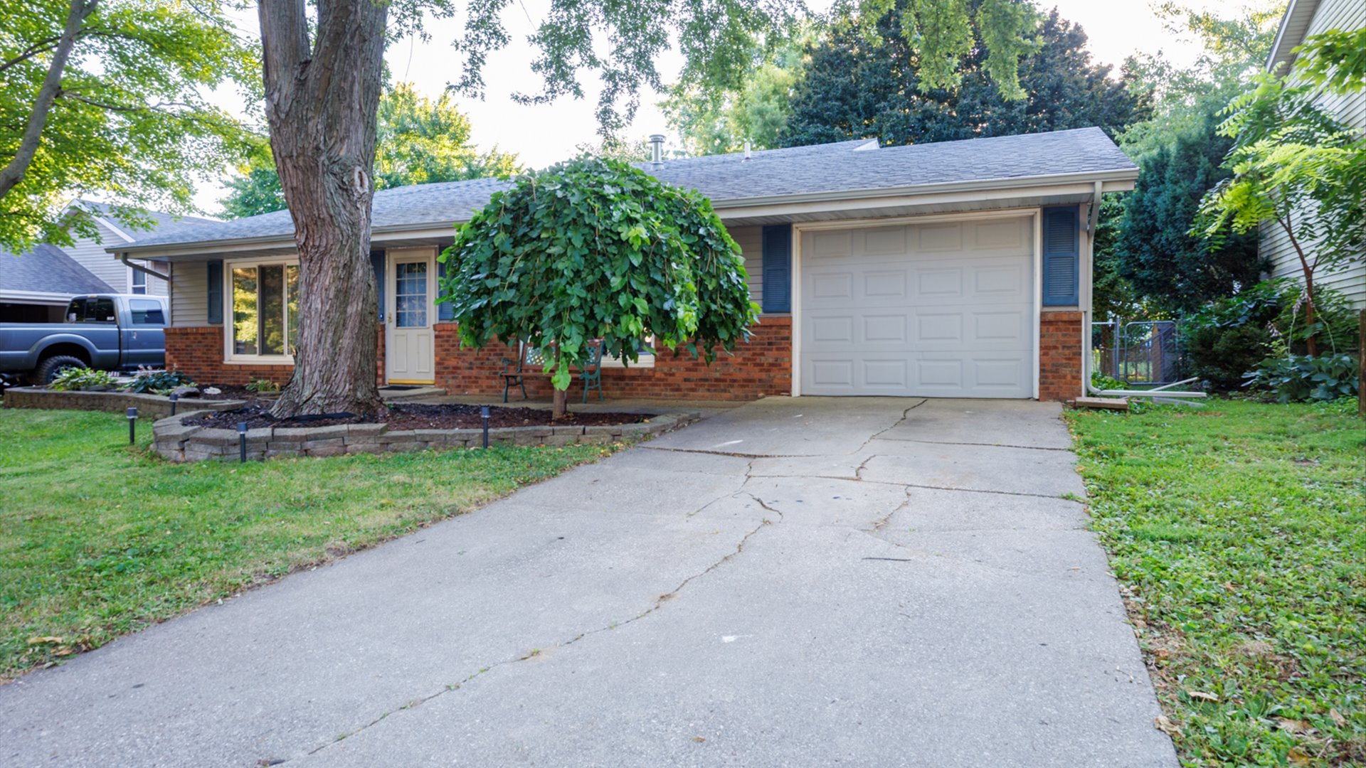 306 Judith Drive Normal, IL 61761 - Photo 2 of 40 a front view of a house with garden