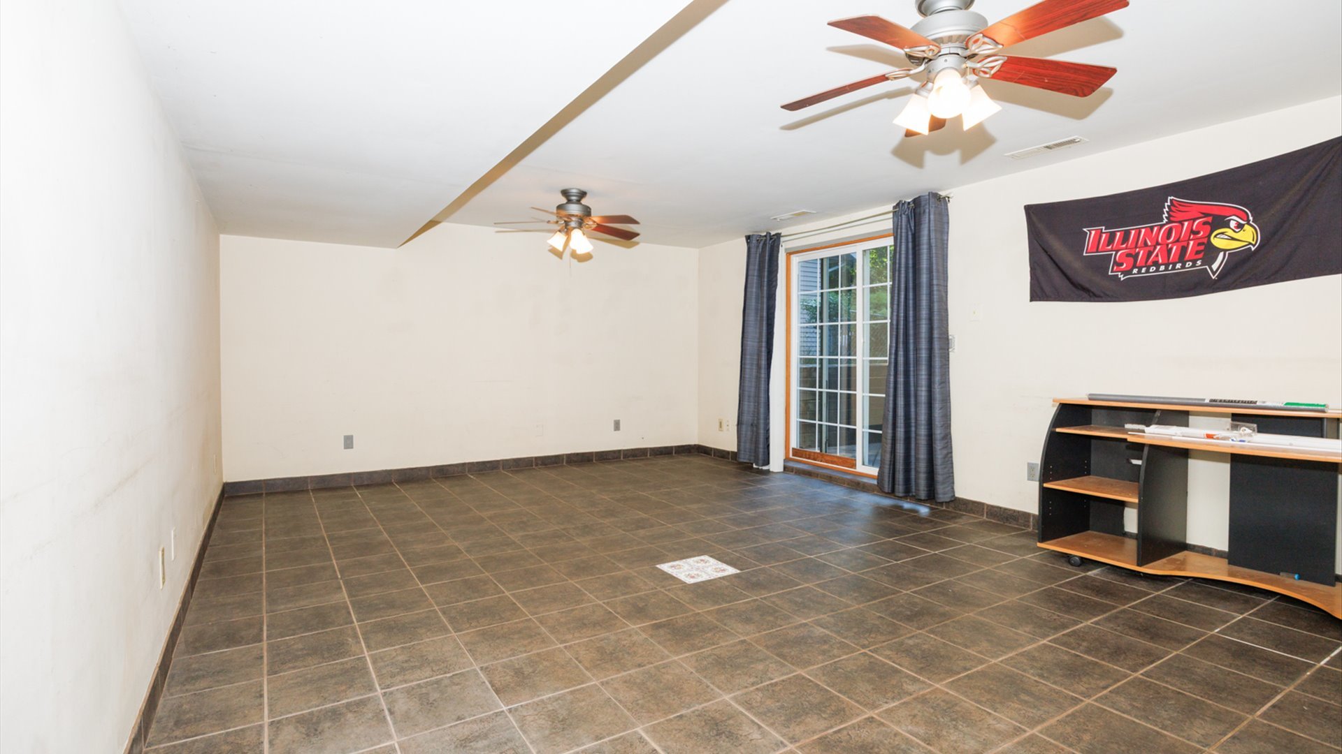 306 Judith Drive Normal, IL 61761 - Photo 27 of 40 a view of an empty room with a window