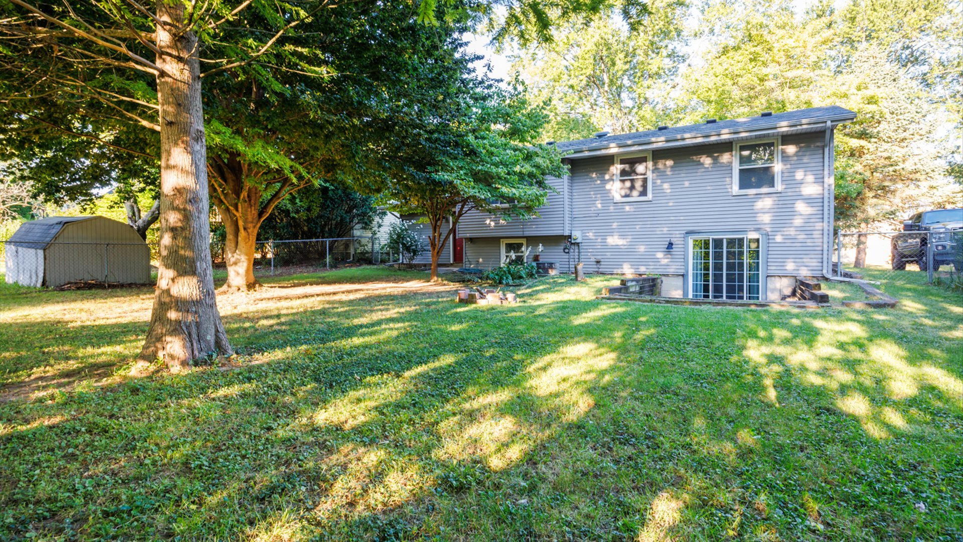 306 Judith Drive Normal, IL 61761 - Photo 37 of 40 a view of a house with a yard