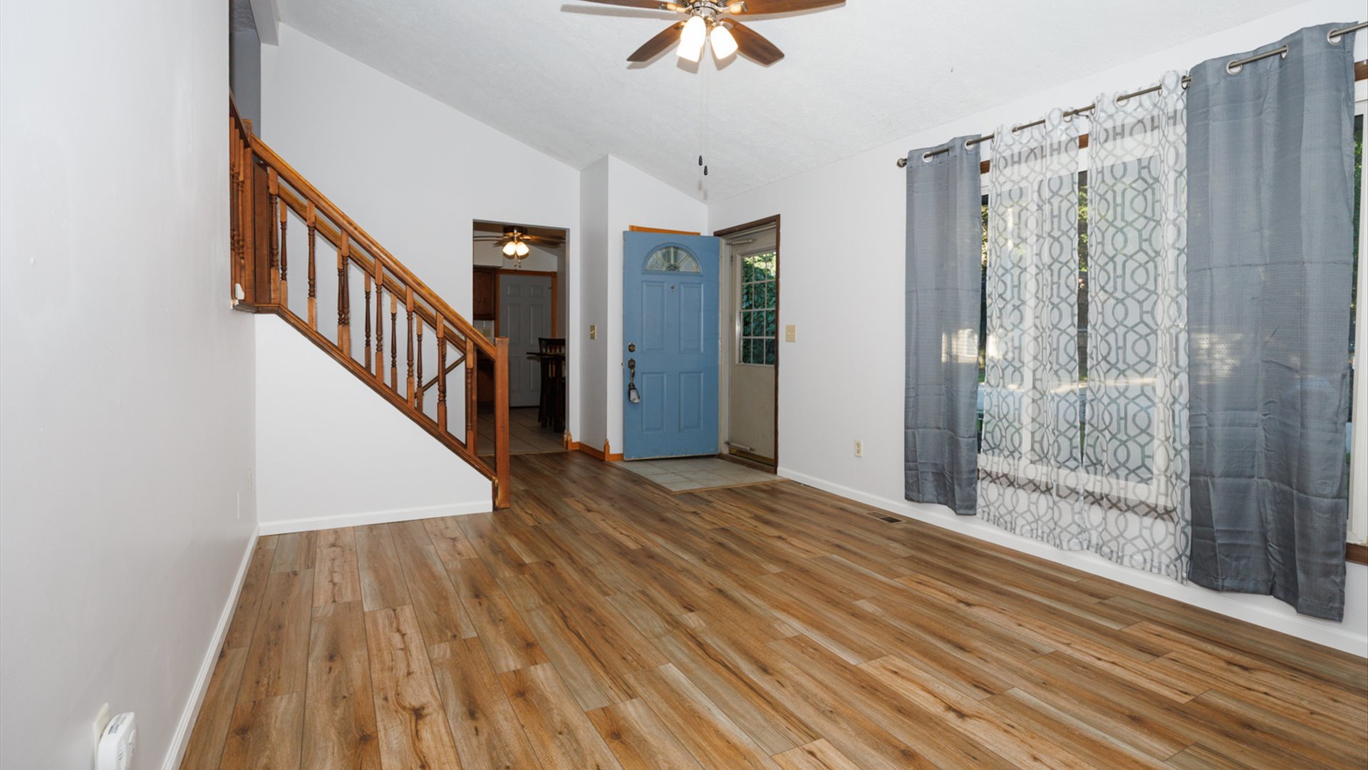 306 Judith Drive Normal, IL 61761 - Photo 8 of 40 a view of an entryway with wooden floor