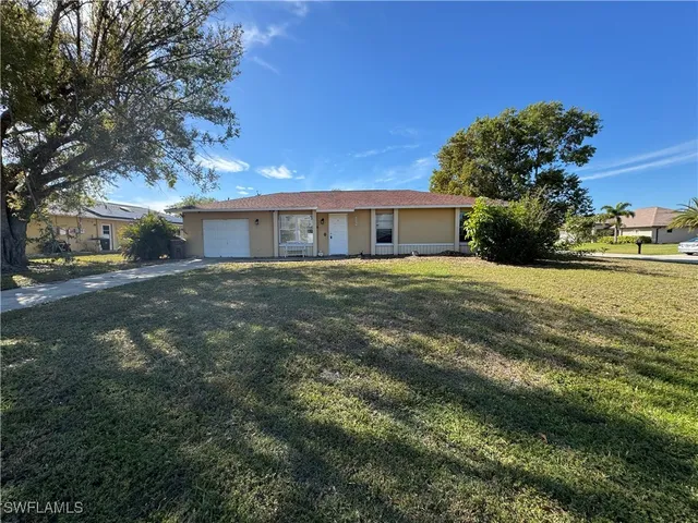 a house view with a garden space