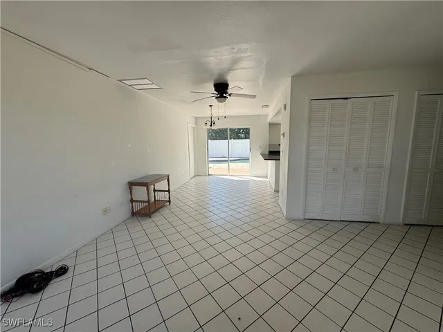 a view of an empty room and window