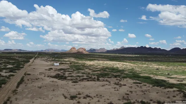 a view of lake with mountain