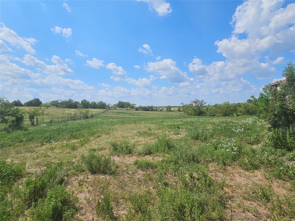810 Cody Road Ennis, TX 75119 - Photo 13 of 31 a view of a green field with sky view