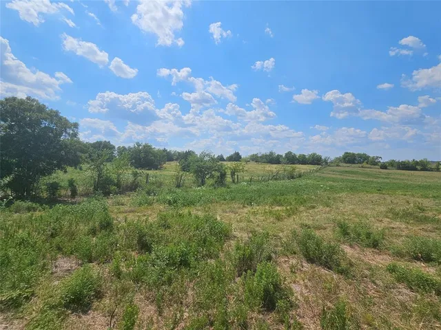 a kitchen with stainless steel appliances granite countertop a lot of refrigerator