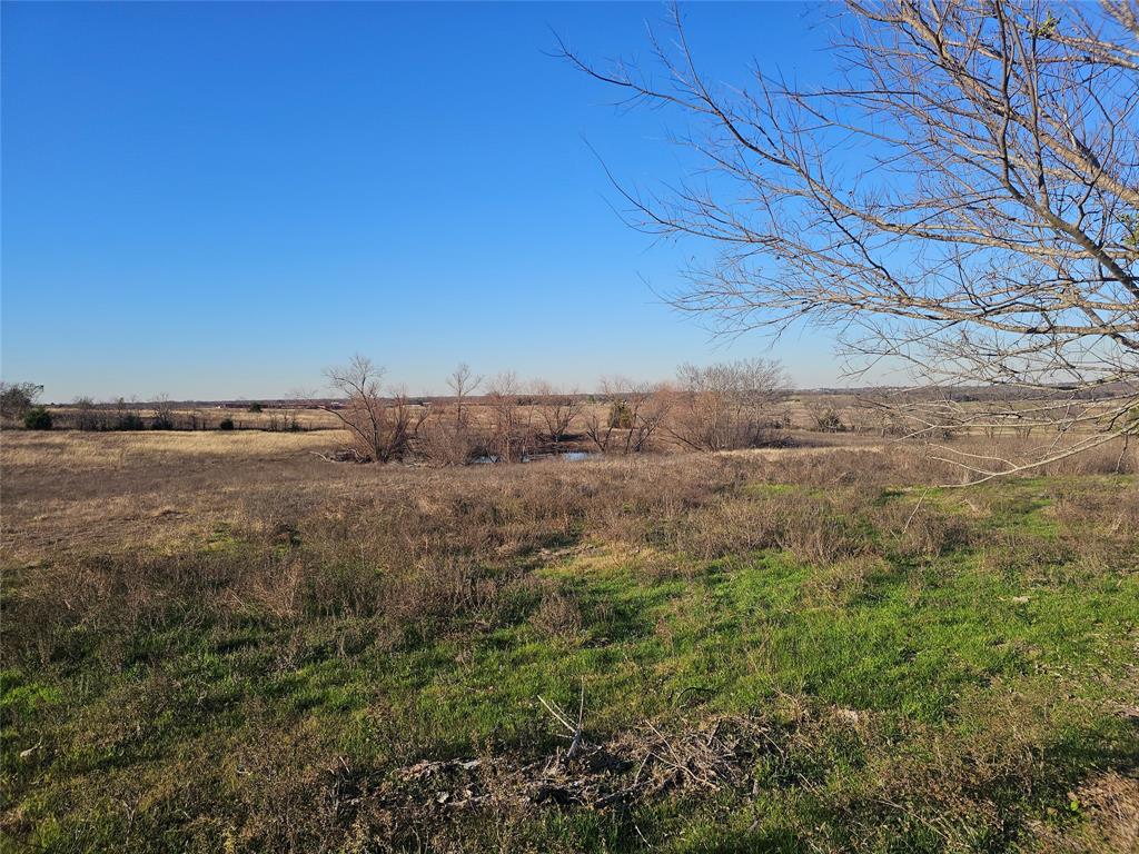 810 Cody Road Ennis, TX 75119 - Photo 5 of 31 a view of lake and mountain