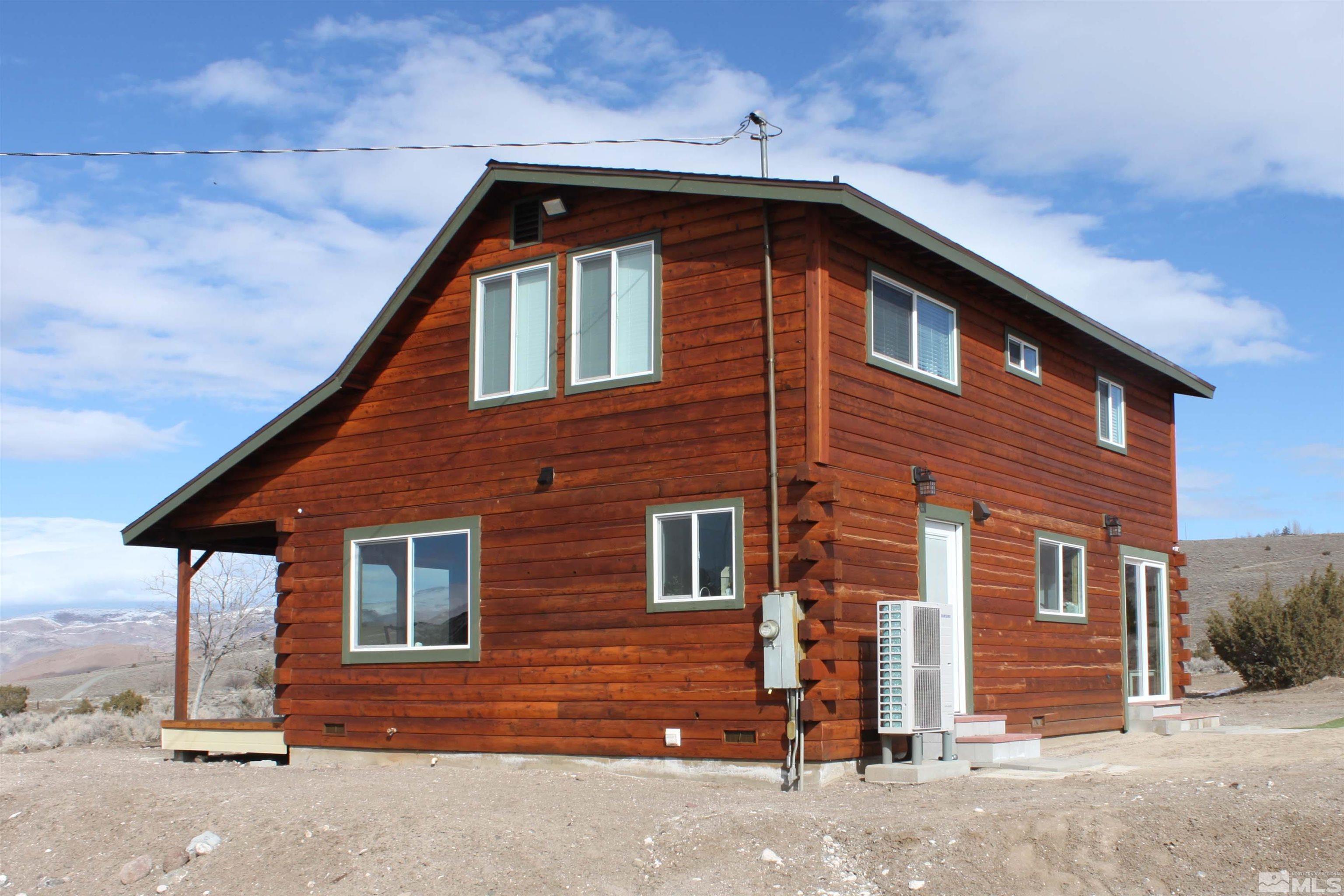 2700 Wilcox Ranch Road Reno, NV 89510 - Photo 1 of 33 a front view of a house with a yard