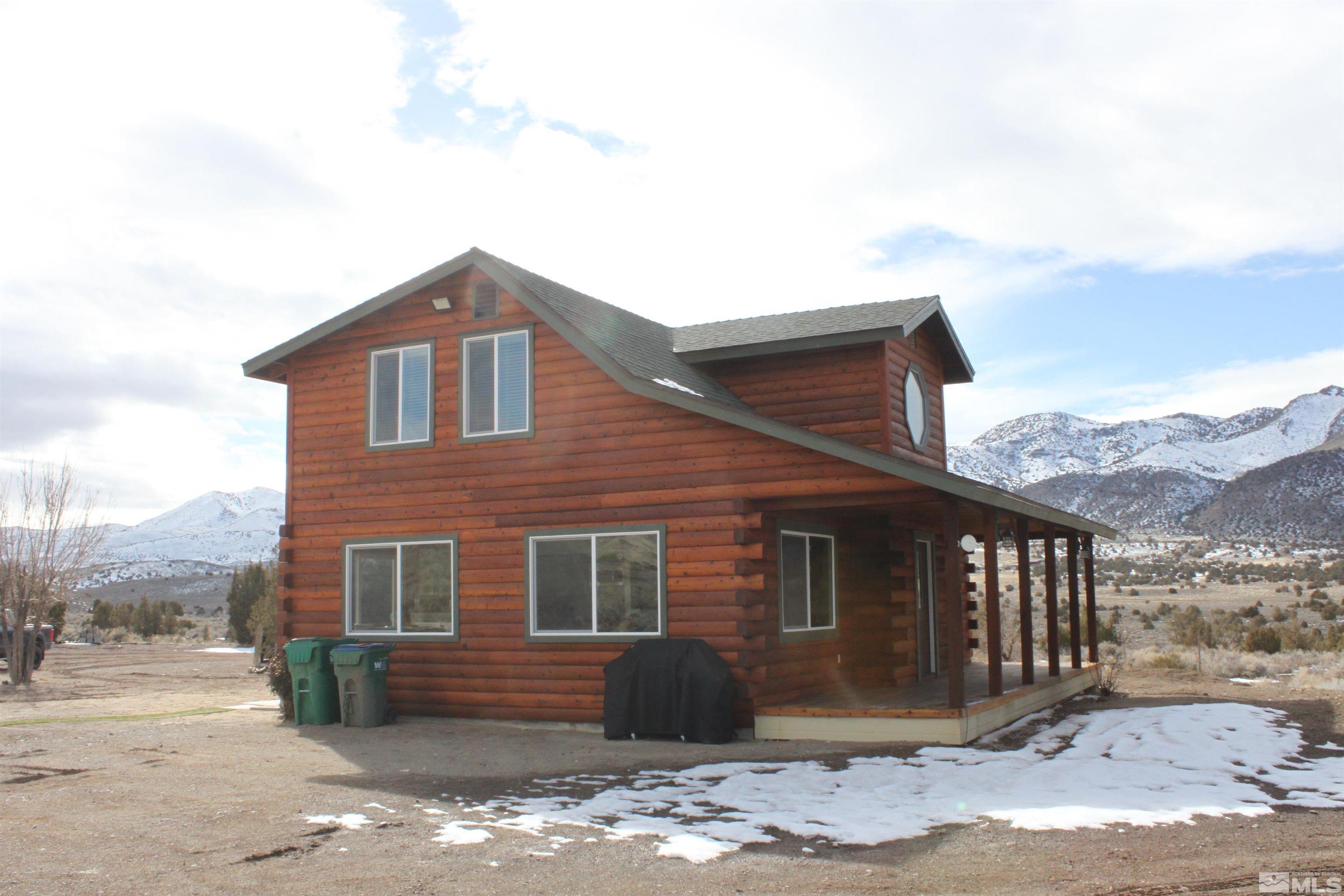 2700 Wilcox Ranch Road Reno, NV 89510 - Photo 2 of 33 a front view of a house with a yard