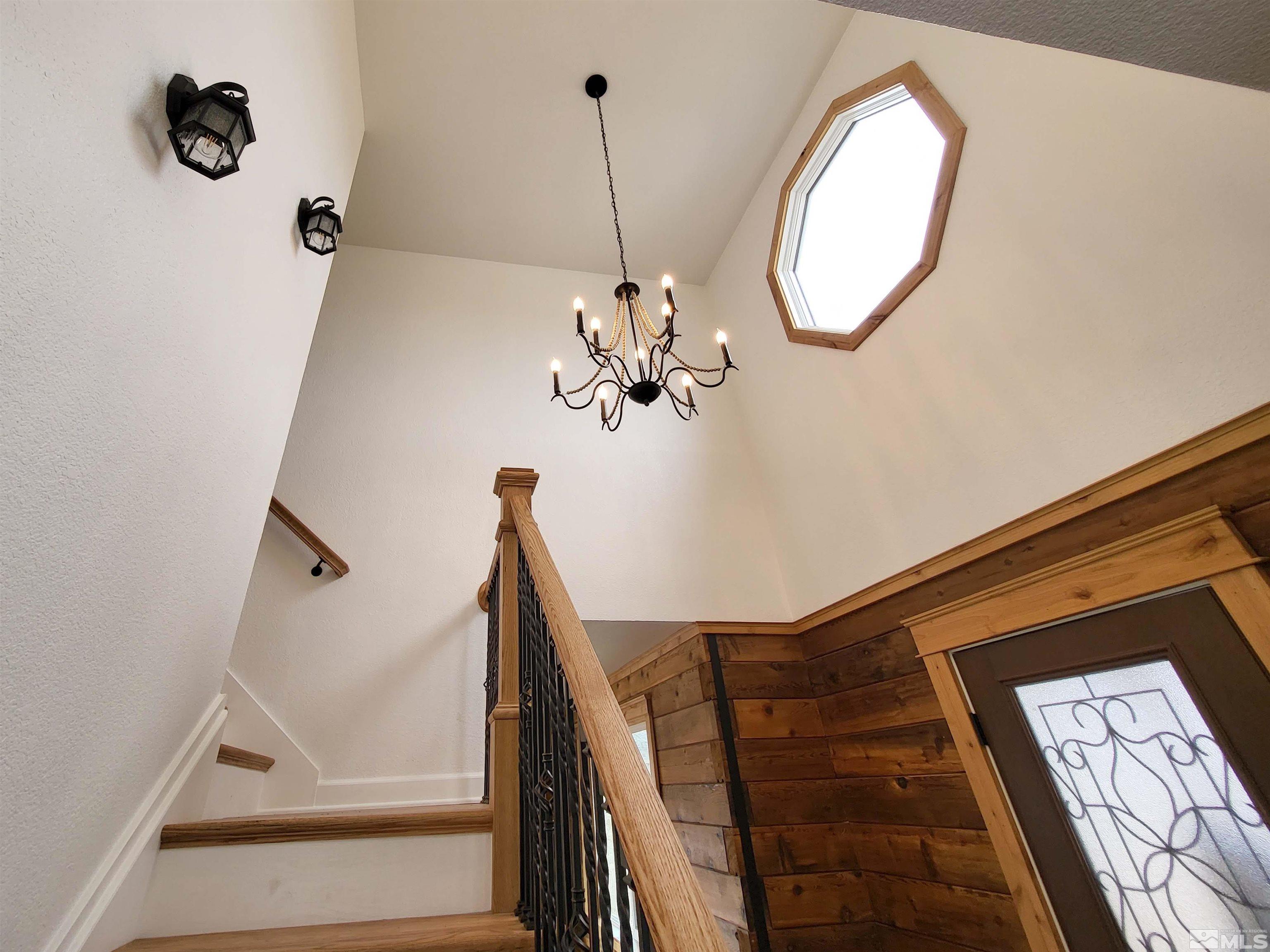 2700 Wilcox Ranch Road Reno, NV 89510 - Photo 23 of 33 a view of a hallway with paintings on the wall