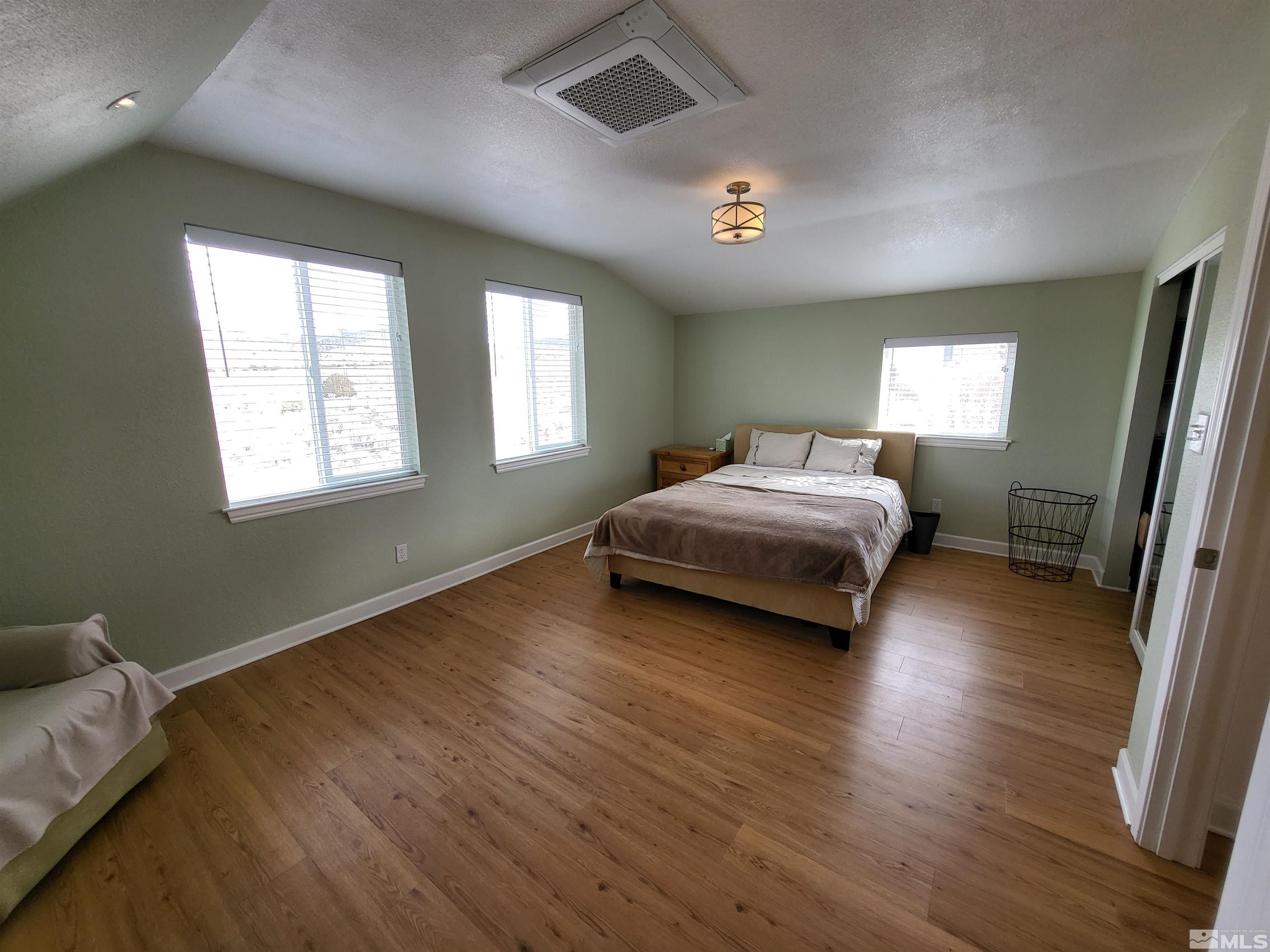 2700 Wilcox Ranch Road Reno, NV 89510 - Photo 25 of 33 a bedroom with a bed and window