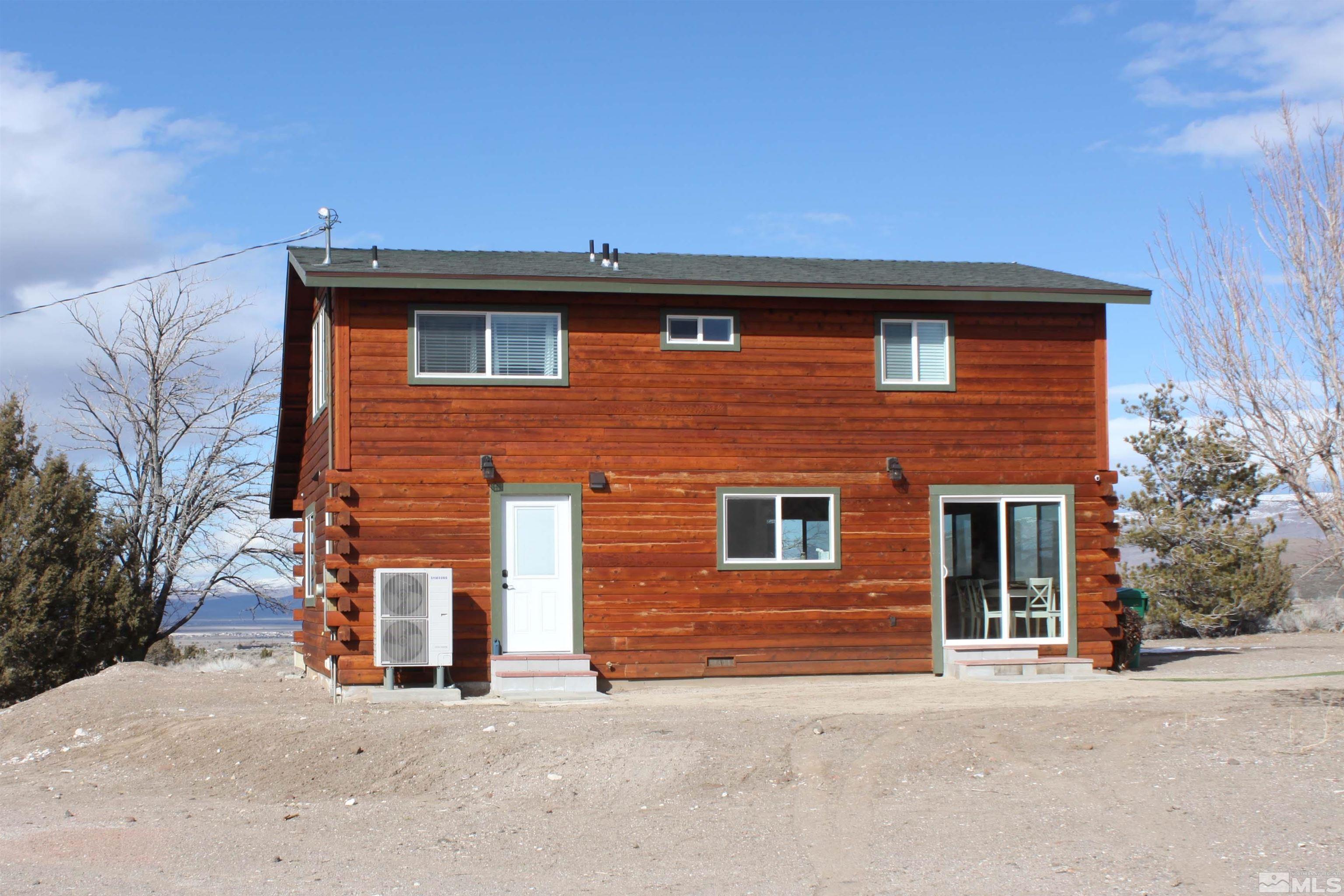 2700 Wilcox Ranch Road Reno, NV 89510 - Photo 32 of 33 a front view of a house with a garage