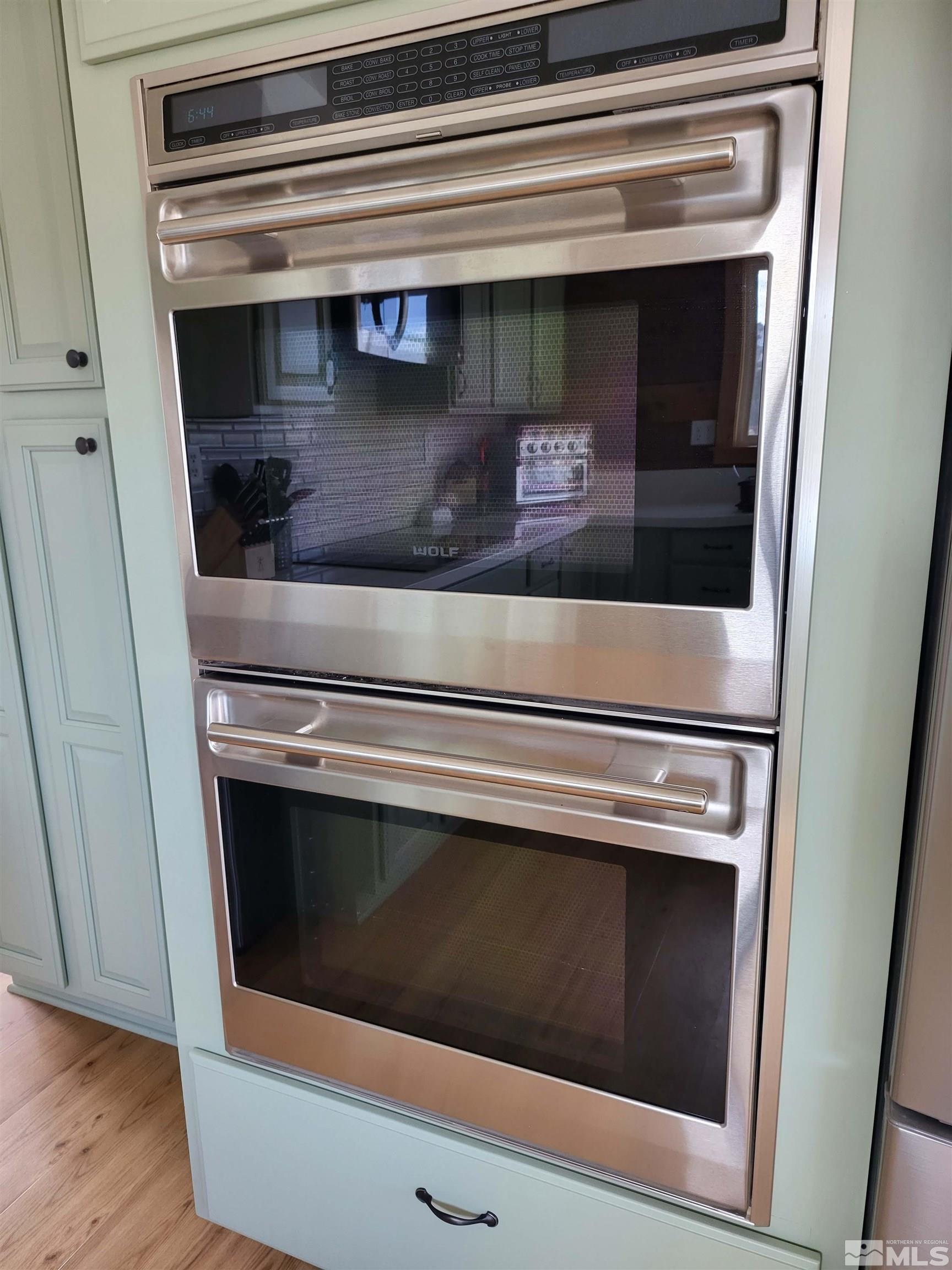 2700 Wilcox Ranch Road Reno, NV 89510 - Photo 10 of 33 a stove top oven sitting inside of a kitchen