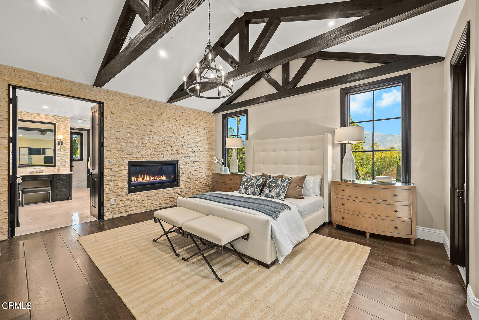 675 Elliott Drive Pasadena, CA 91106 - Photo 15 of 39 a spacious bedroom with a bed and a fireplace