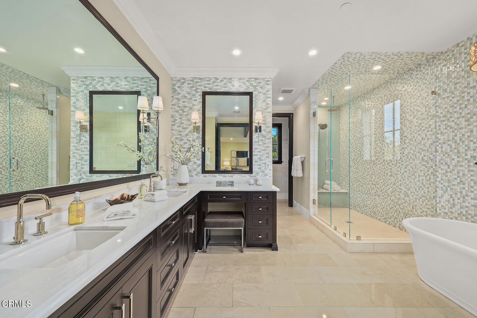 675 Elliott Drive Pasadena, CA 91106 - Photo 16 of 39 a bathroom with a bathtub a double vanity sink and mirror