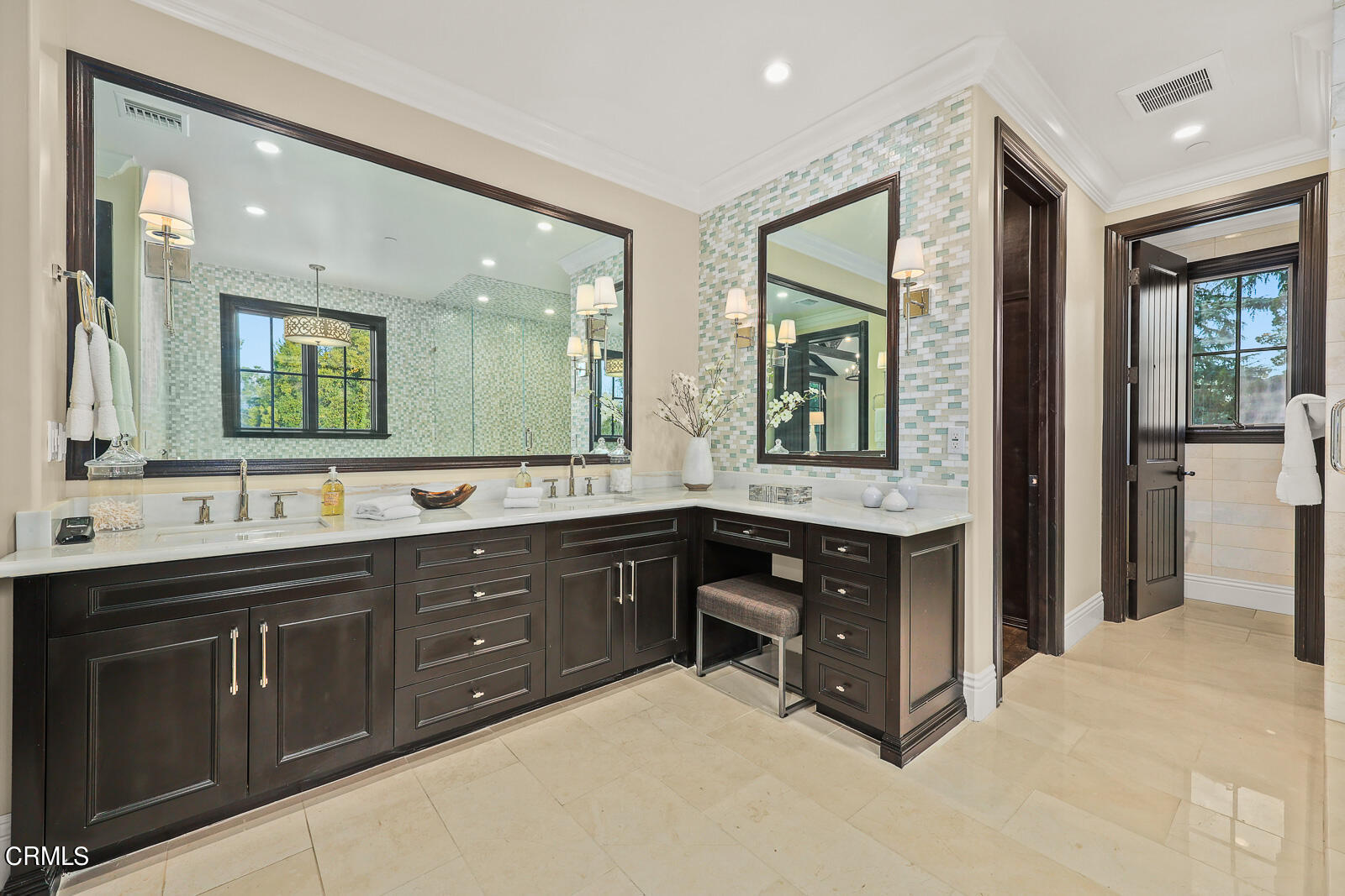 675 Elliott Drive Pasadena, CA 91106 - Photo 17 of 39 a spacious bathroom with a double vanity sink and a large mirror