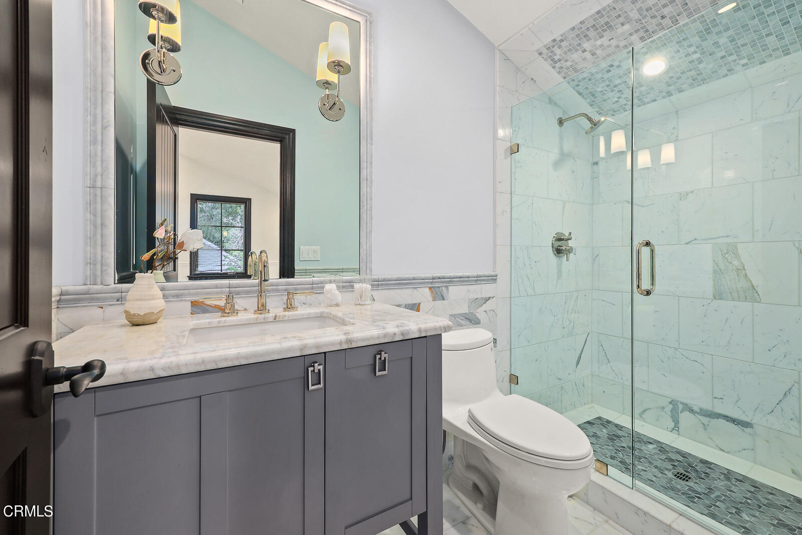 675 Elliott Drive Pasadena, CA 91106 - Photo 24 of 39 a bathroom with a granite countertop toilet sink shower and mirror