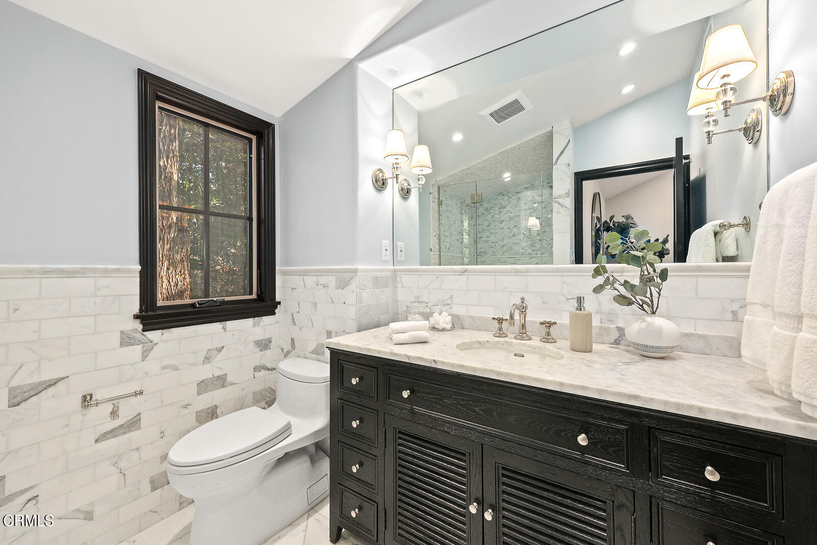 675 Elliott Drive Pasadena, CA 91106 - Photo 30 of 39 a bathroom with a toilet a sink a mirror a window and vanity