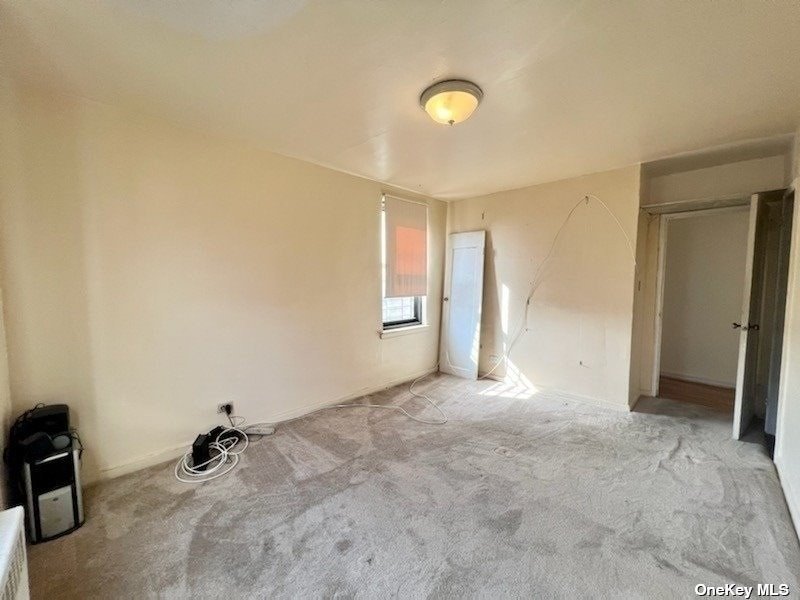 112-24 Northern Boulevard, Unit 4B Queens, NY 11368 - Photo 8 of 9 a view of an empty room