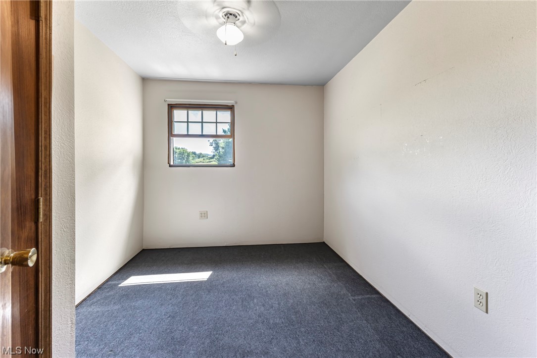 1491 Arner Road Chester, WV 26034 - Photo 10 of 35 View of carpeted empty room