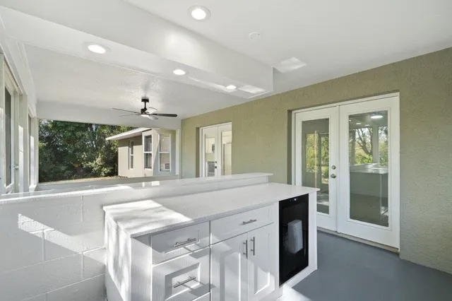a view of a kitchen counter space with sink