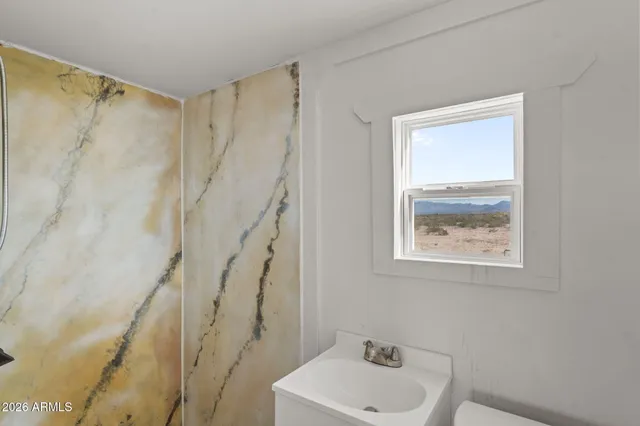 a view of a lake with a beach