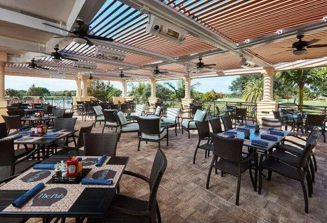a view of a tables and chairs in patio