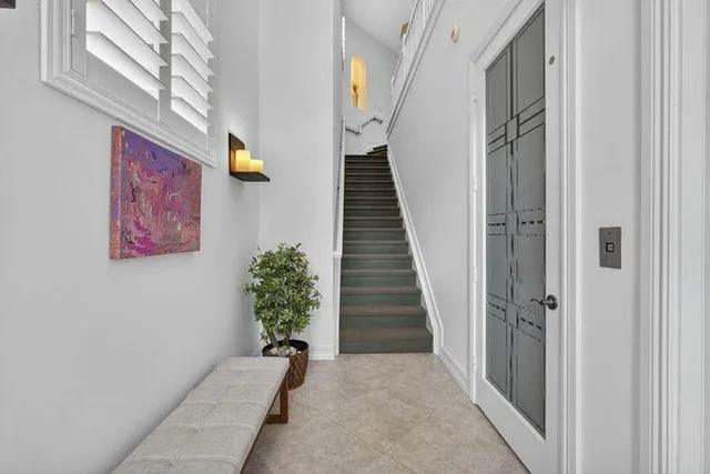 a view of entryway with stairs