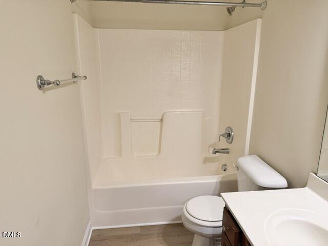 8227 Primanti Boulevard Raleigh, NC 27612 - Photo 20 of 25 a white toilet sitting next to a bath tub