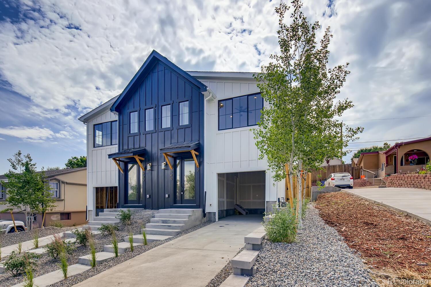 949 Raleigh Street, Unit 2 Denver, CO 80204 - Photo 2 of 26 a front view of a house with garden