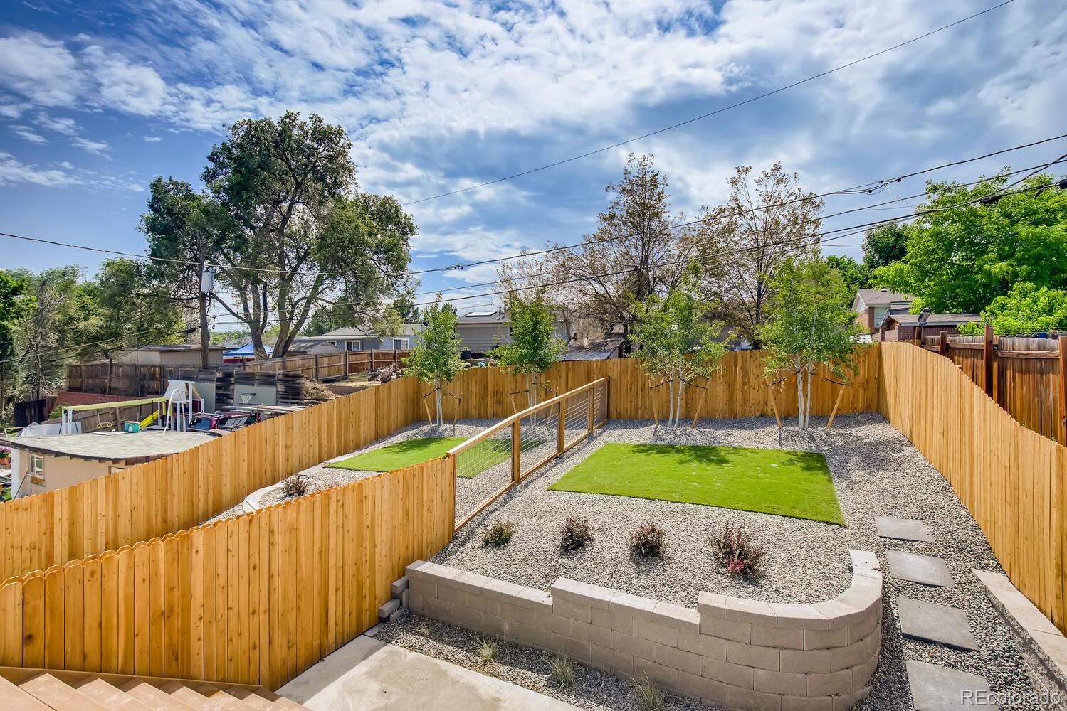 949 Raleigh Street, Unit 2 Denver, CO 80204 - Photo 24 of 26 a view of swimming pool with outdoor seating and plants