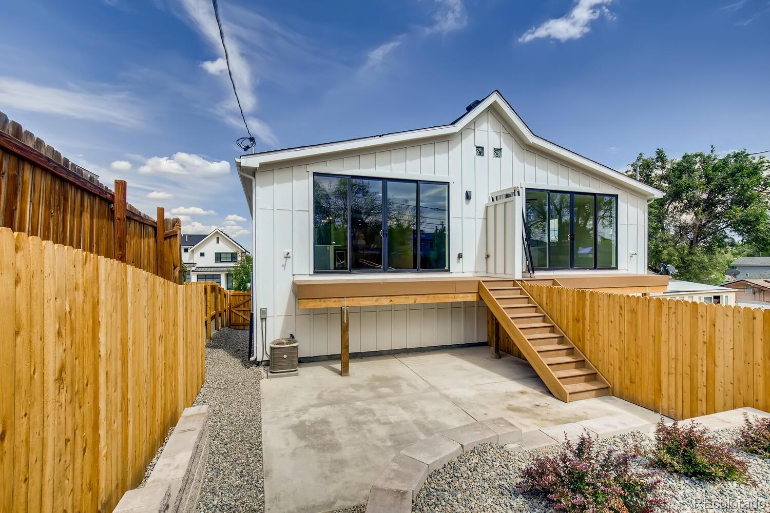 949 Raleigh Street, Unit 2 Denver, CO 80204 - Photo 25 of 26 a view of a white building with a outdoor space