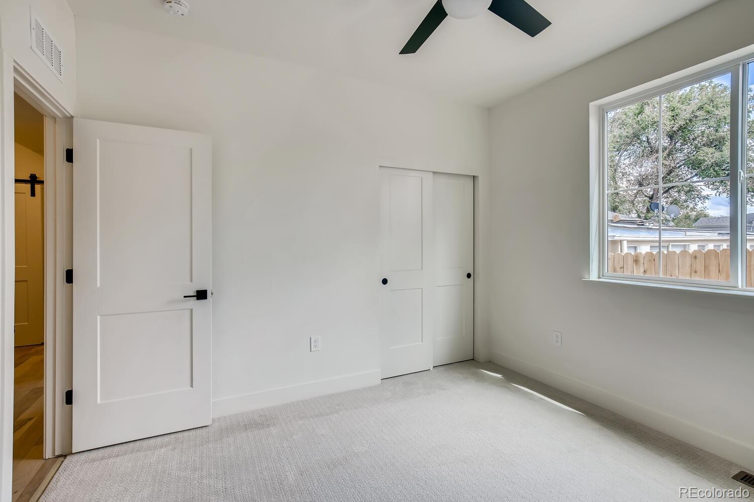 949 Raleigh Street, Unit 2 Denver, CO 80204 - Photo 10 of 26 a view of an empty room with a window