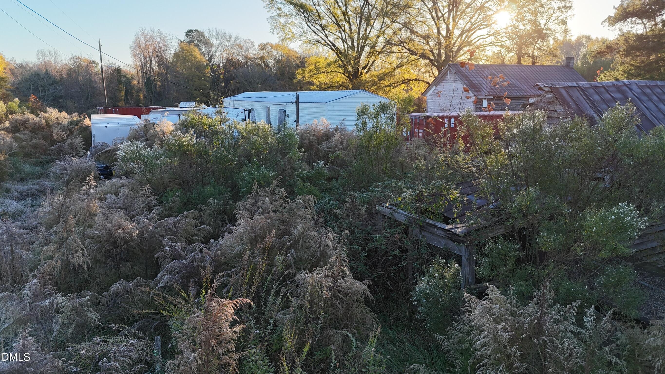 1604 Bonlee School Road Bear Creek, NC 27207 - Photo 50 of 71 a view of a house with a yard