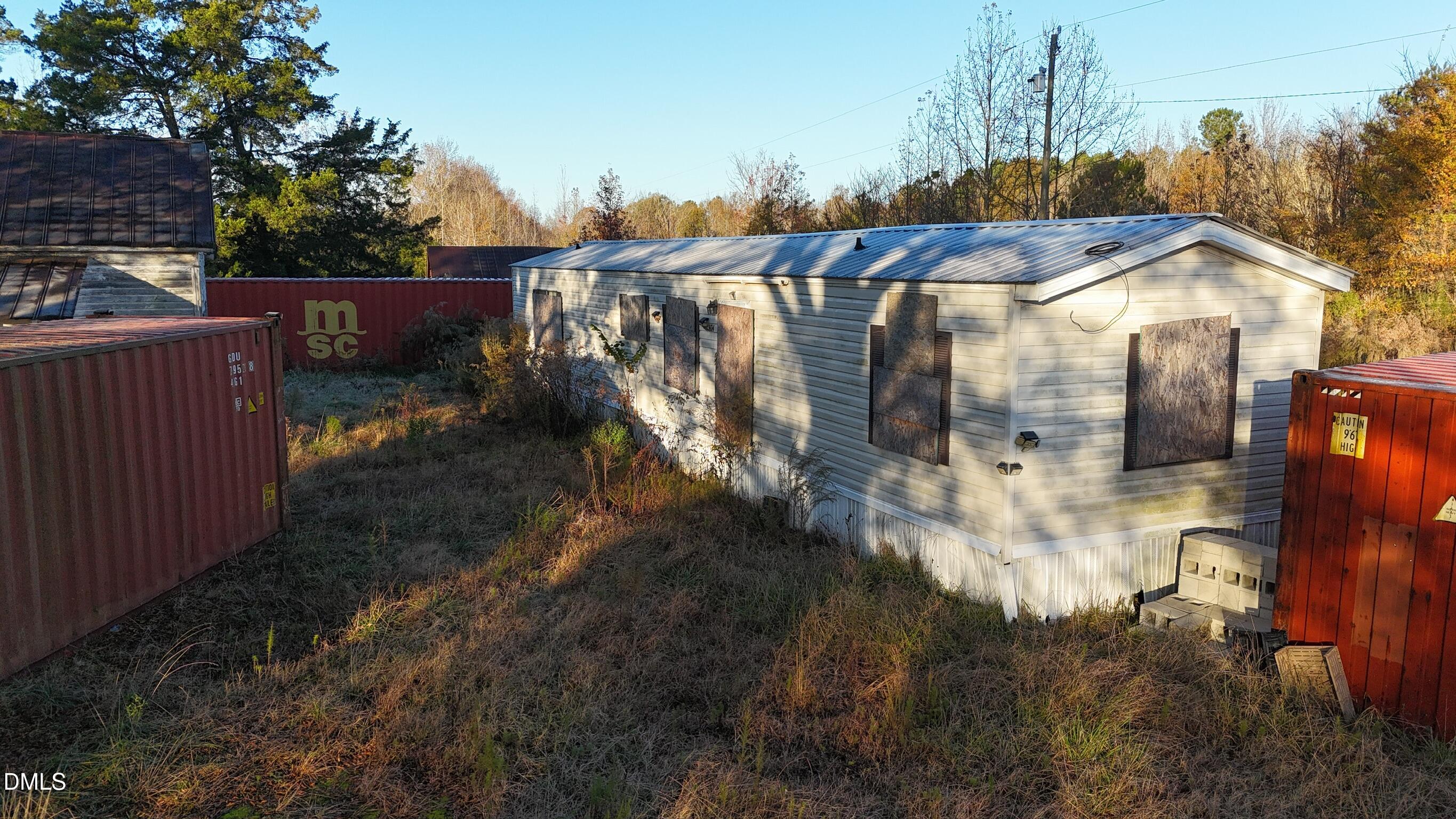 1604 Bonlee School Road Bear Creek, NC 27207 - Photo 51 of 71 a view of a house with a yard