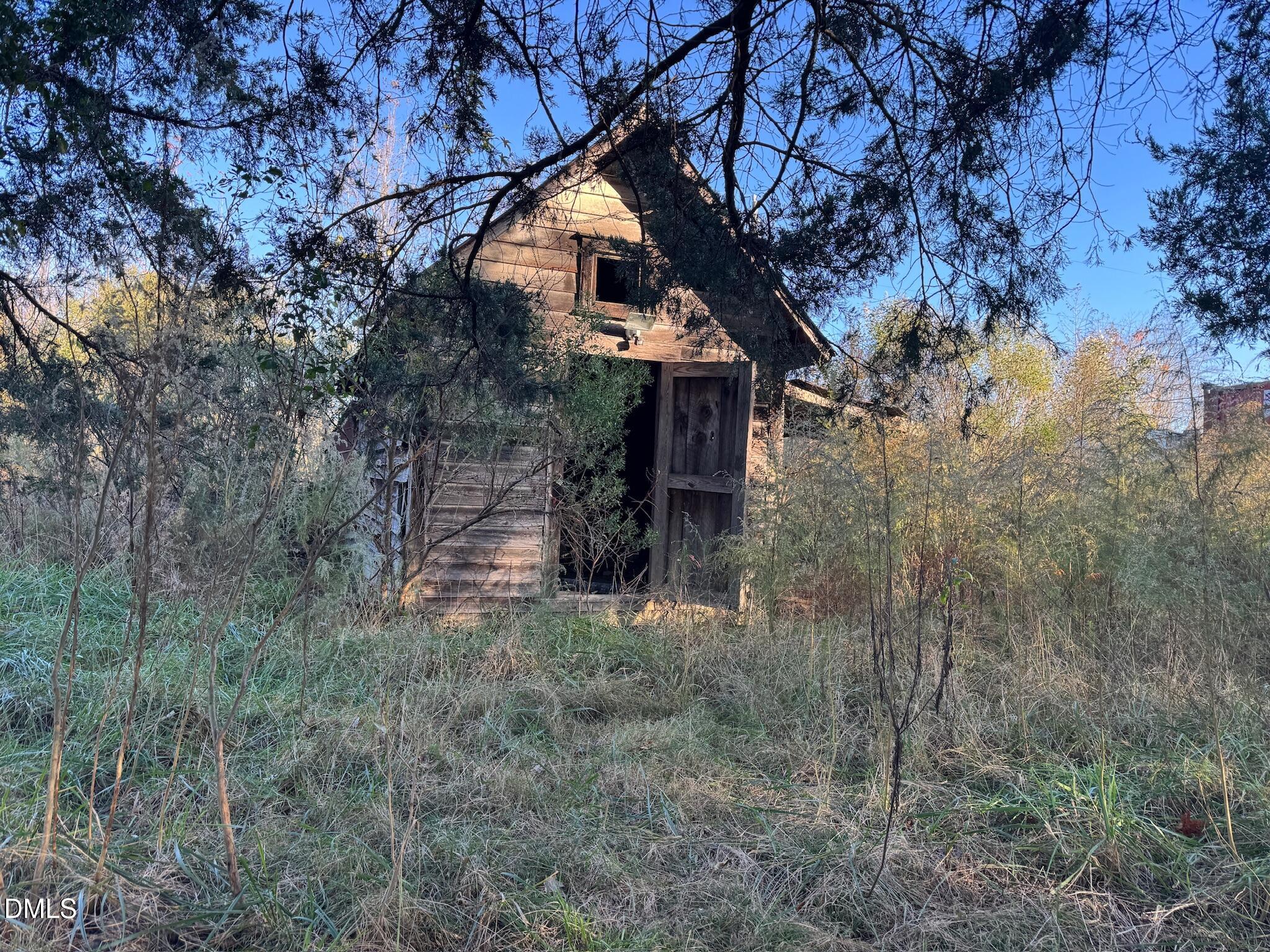 1604 Bonlee School Road Bear Creek, NC 27207 - Photo 66 of 71 a view of a house with a yard