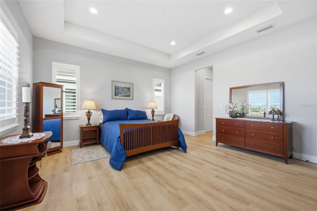 2154 Wallingford Loop Mount Mount Dora, FL 32757 - Photo 23 of 52 a living room with furniture and a large window