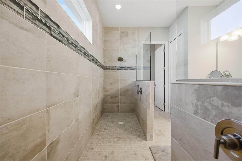 2154 Wallingford Loop Mount Mount Dora, FL 32757 - Photo 31 of 52 a bathroom with a shower