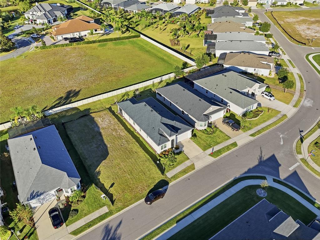 2154 Wallingford Loop Mount Mount Dora, FL 32757 - Photo 38 of 52 an aerial view of a house with a ocean view