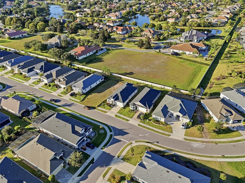 2154 Wallingford Loop Mount Mount Dora, FL 32757 - Photo 40 of 52 an aerial view of residential houses with outdoor space