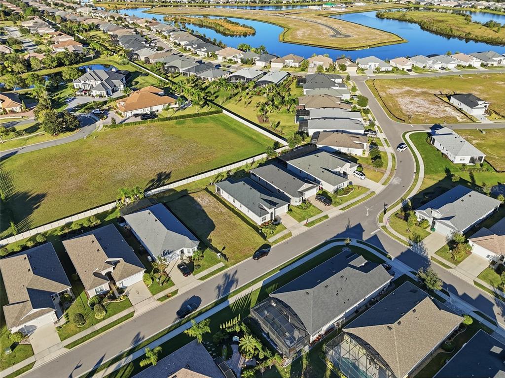 2154 Wallingford Loop Mount Mount Dora, FL 32757 - Photo 41 of 52 an aerial view of residential houses with outdoor space