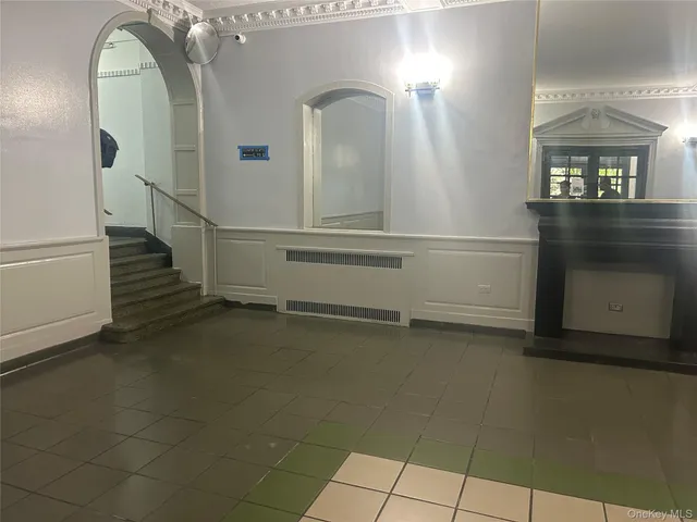 a view of a livingroom with a staircase