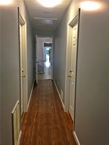 a view of a bathroom from the hallway