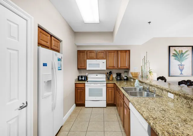 a dining room with furniture wooden floor a chandelier