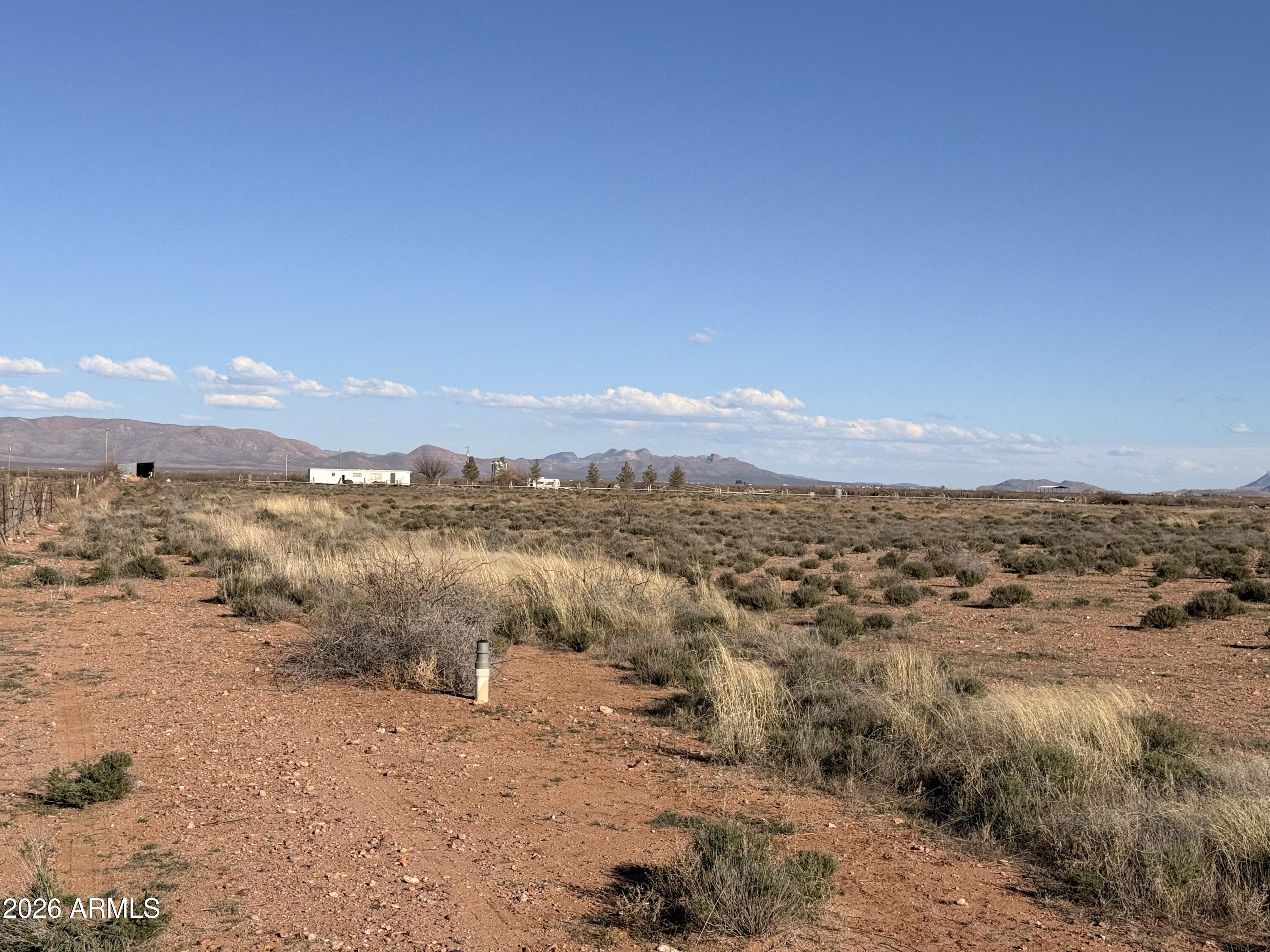 9398 North Hansen Road McNeal, AZ 85617 - Photo 13 of 26 a view of a mountain with sunset
