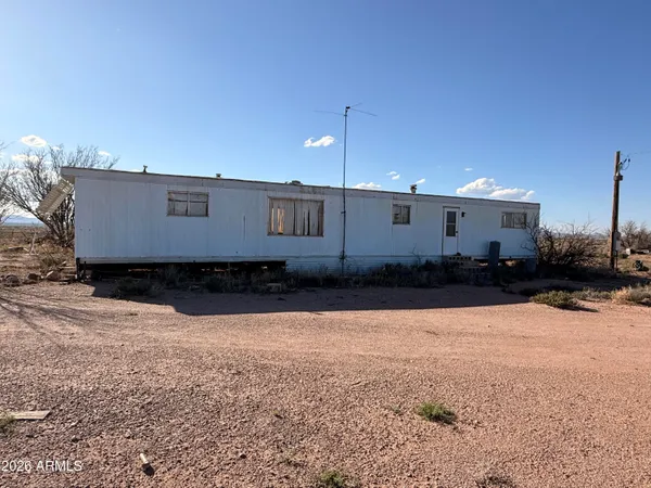 a view of snow on the road