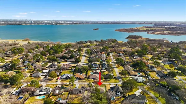 a view of a lake with a city