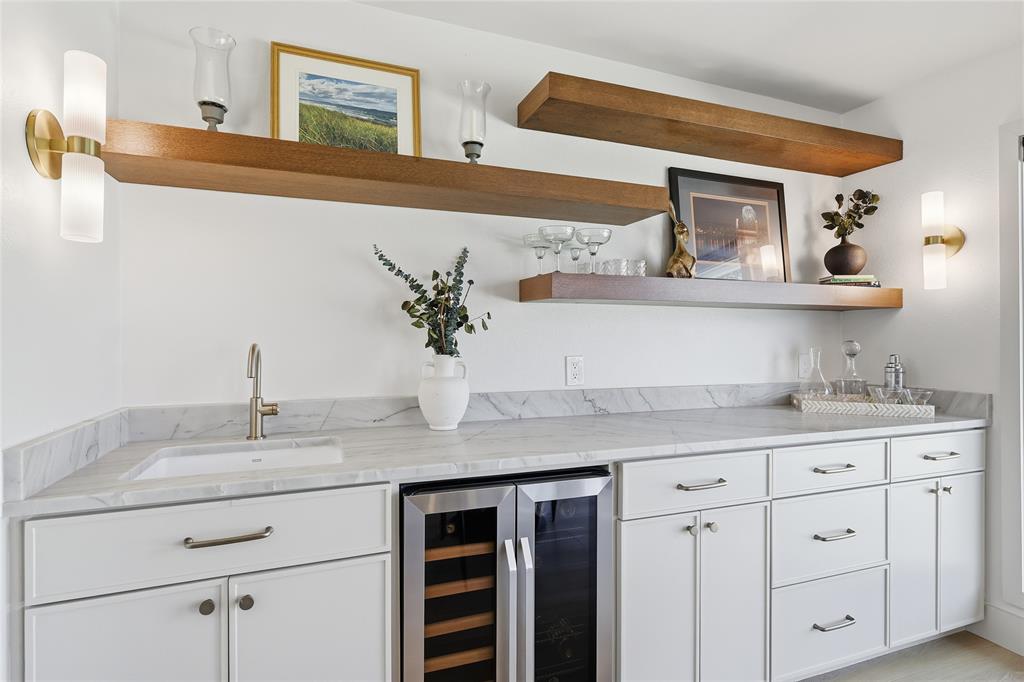 3611 High Drive Grapevine, TX 76051 - Photo 17 of 40 a kitchen with a sink and cabinets