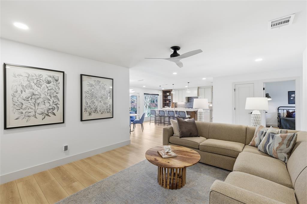 3611 High Drive Grapevine, TX 76051 - Photo 19 of 40 a living room with furniture and a wooden floor