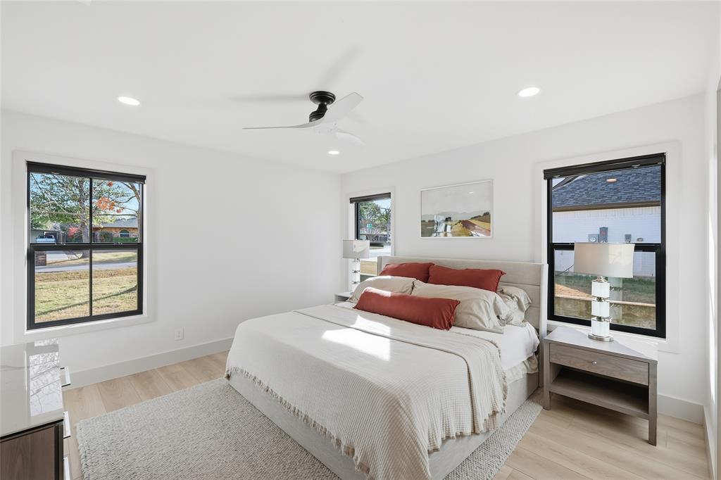 3611 High Drive Grapevine, TX 76051 - Photo 22 of 40 a bedroom with a large bed and a window